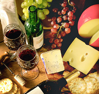 Table With Grapes, Wine and Cheese